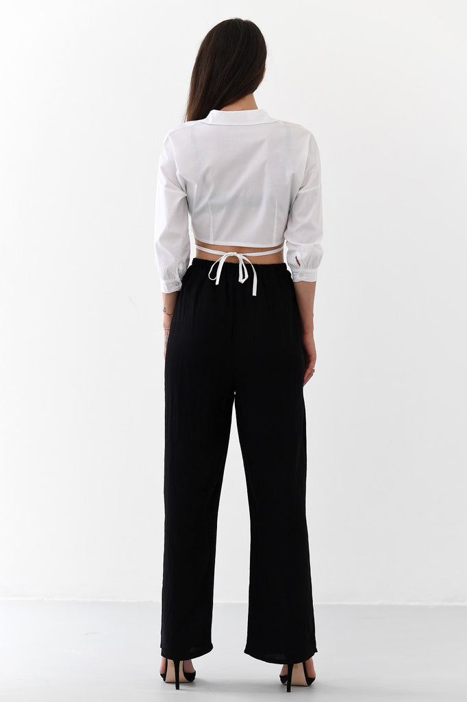 Pantalone a palazzo nero a vita alta - Tabloit.it