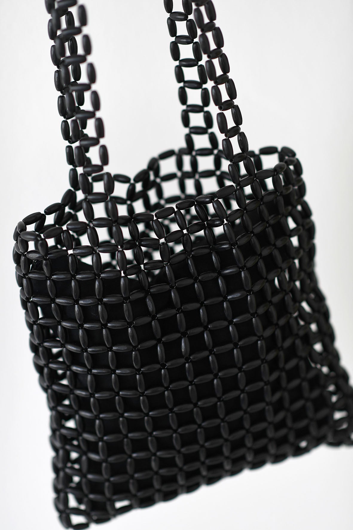 Borsa in perline di legno